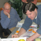 Software developer Sean Graham helps workshop participants create their Evidence for Climate Change map in the COSEE-OS Concept Map Builder