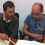 Felix Landerer works one-on-one with a workshop participant